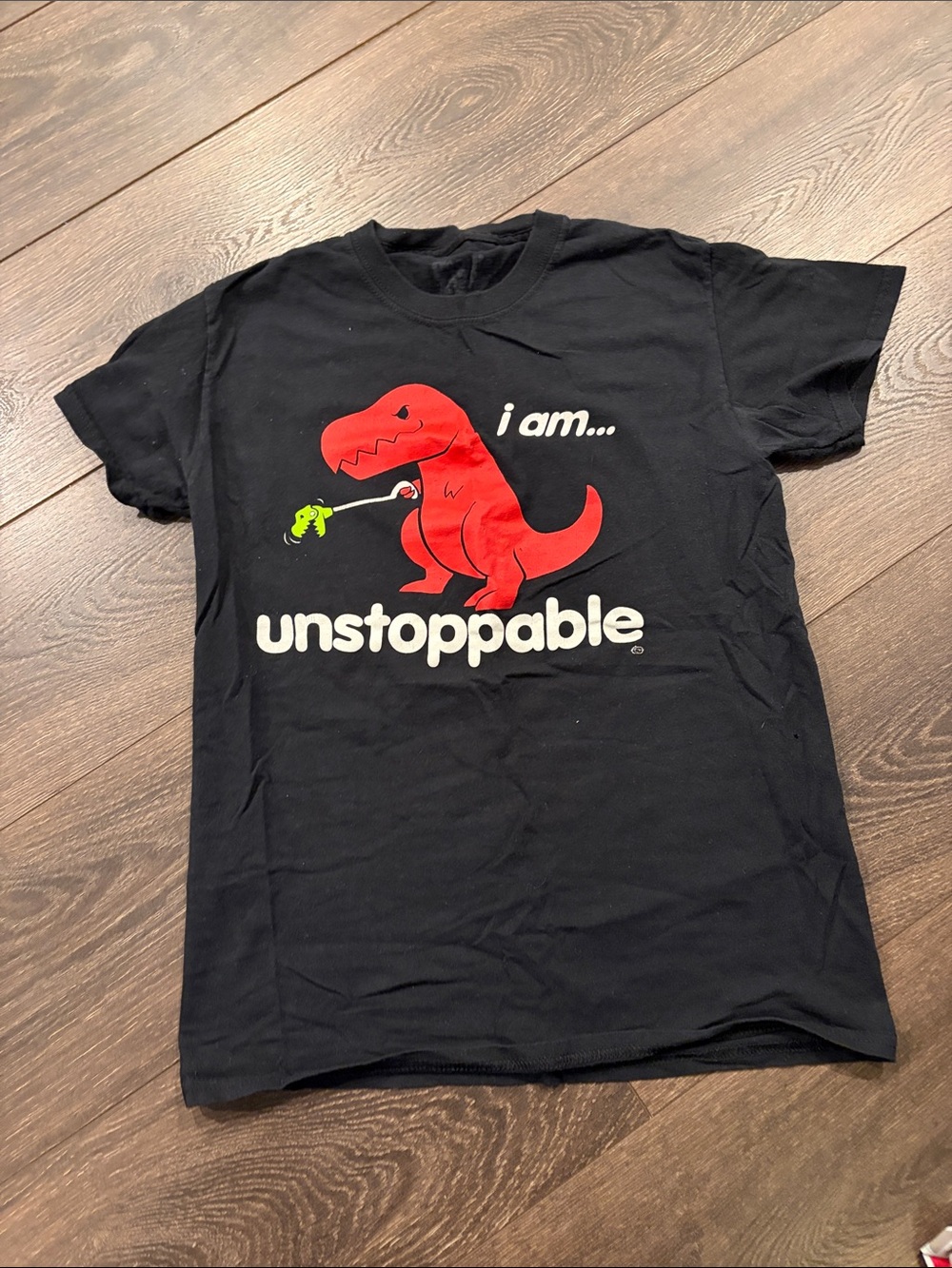 I Am Unstoppable Red Dino Graphic Tee - Black